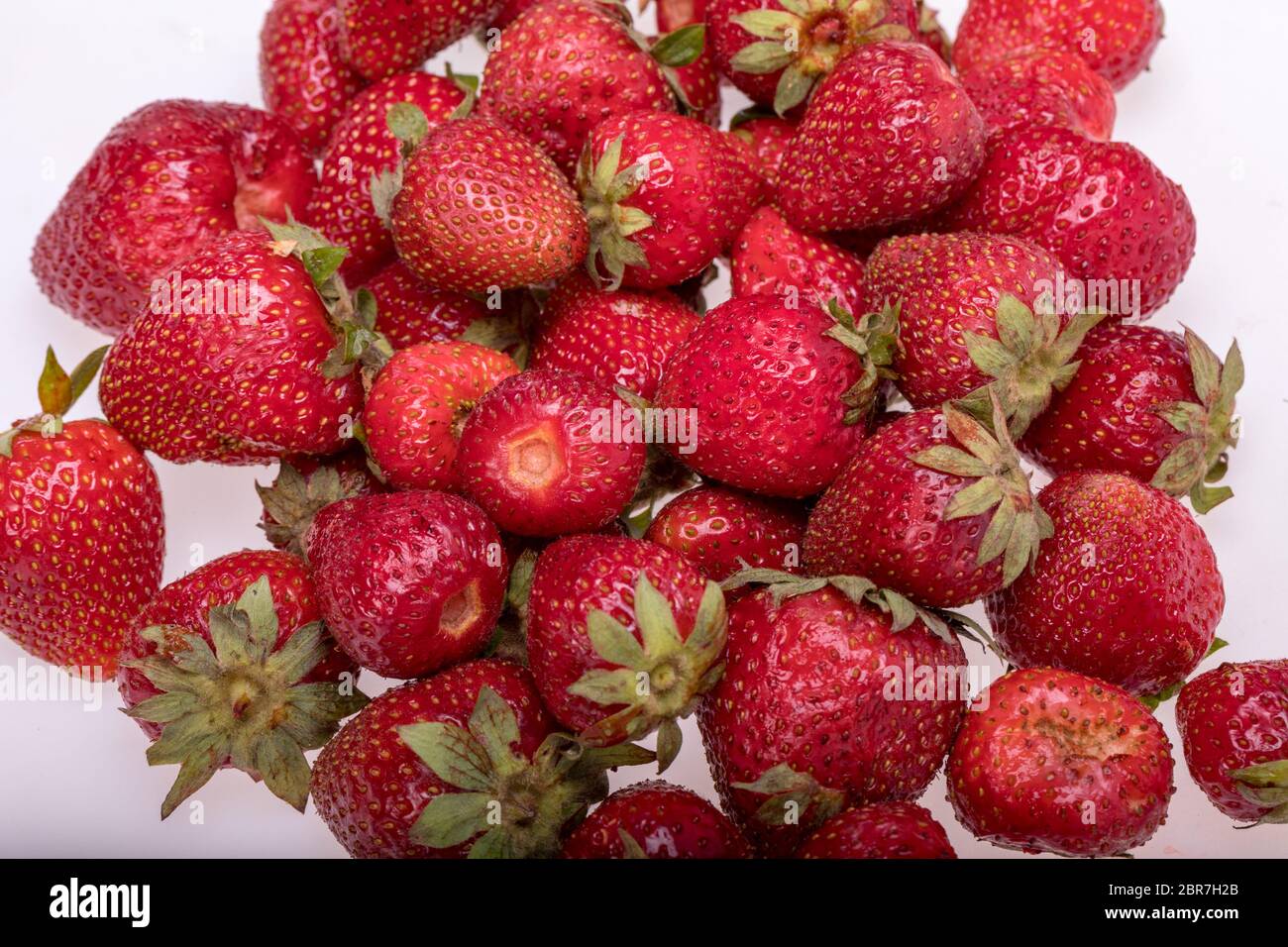 fresh ripe strawberries isolated on white background Stock Photo - Alamy