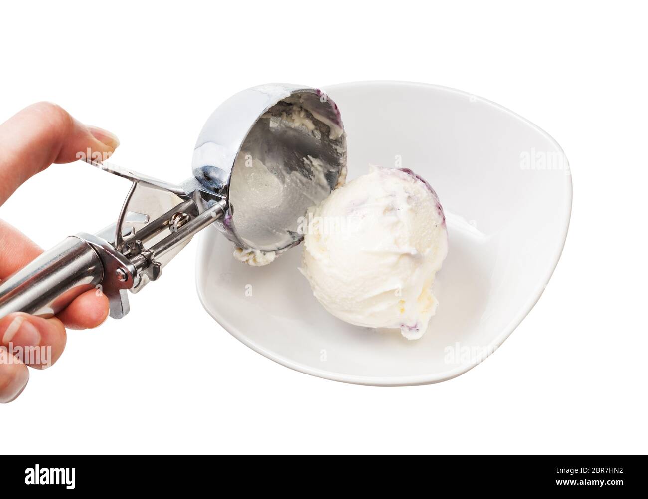 Disher scoop puts a ball of ice cream in bowl Stock Photo by