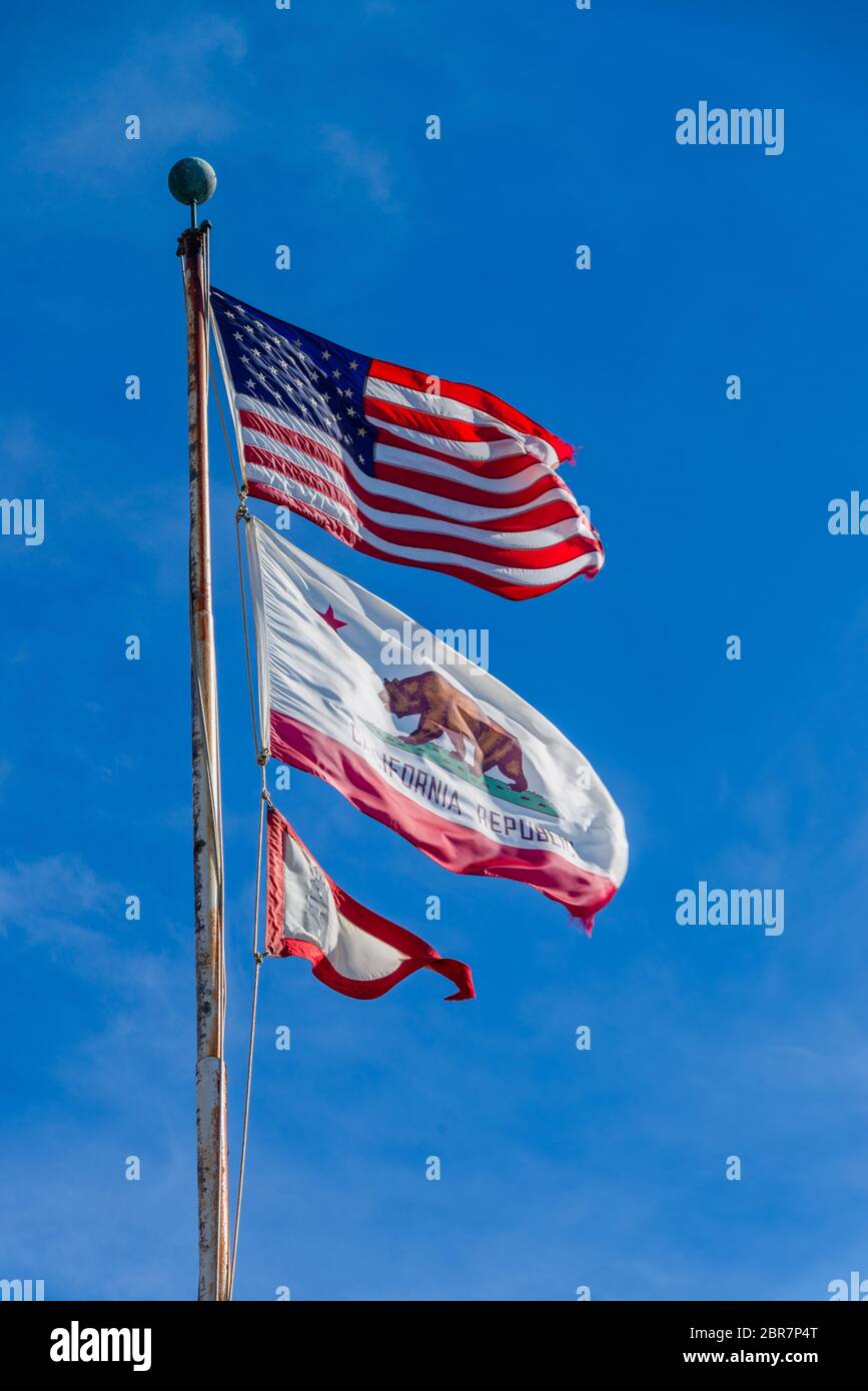 THe US Stars and Stripes, old glory and the California Republic flags Stock Photo