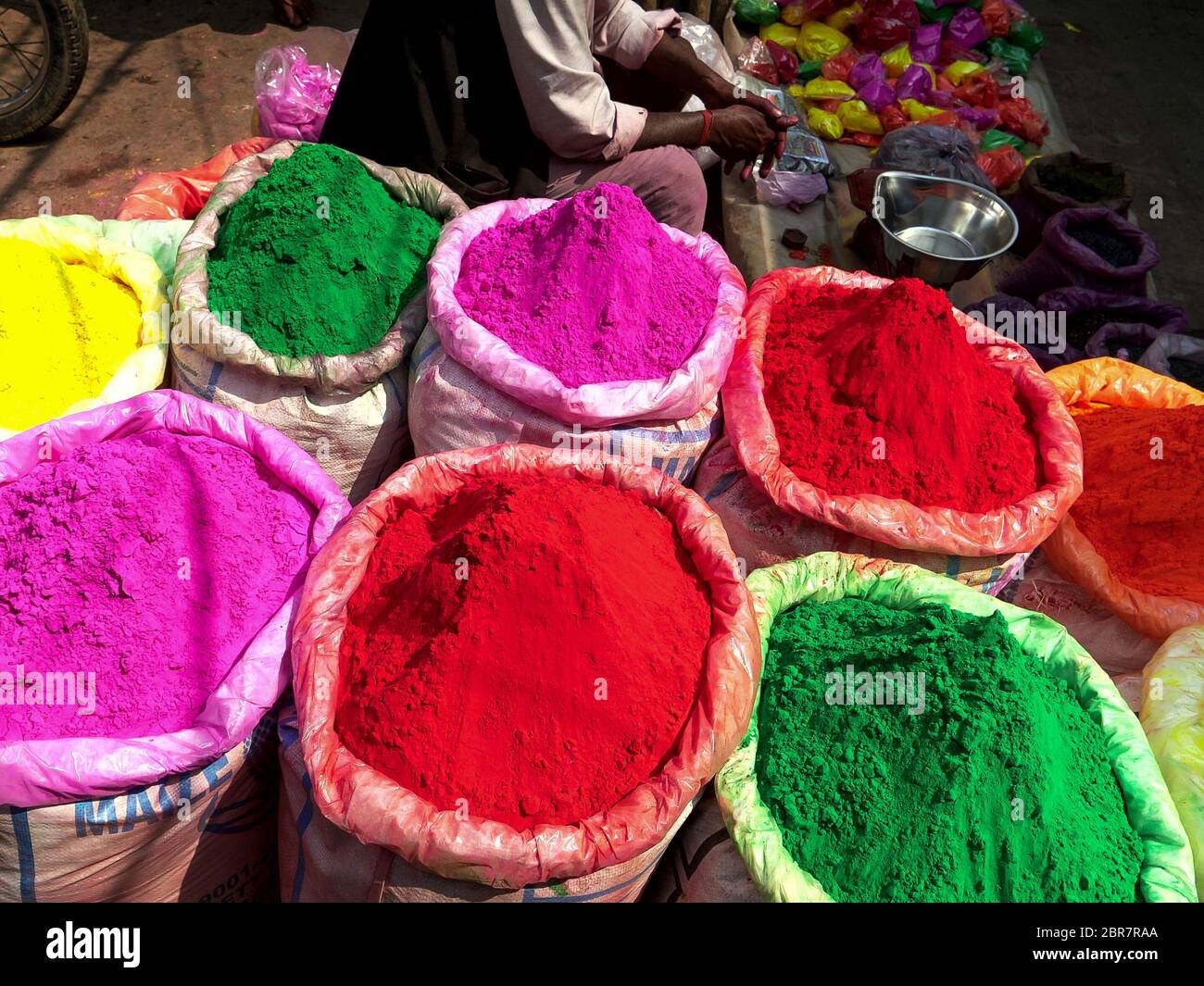 large bags of powder for holi at the spice market of chandni chowk Stock Photo