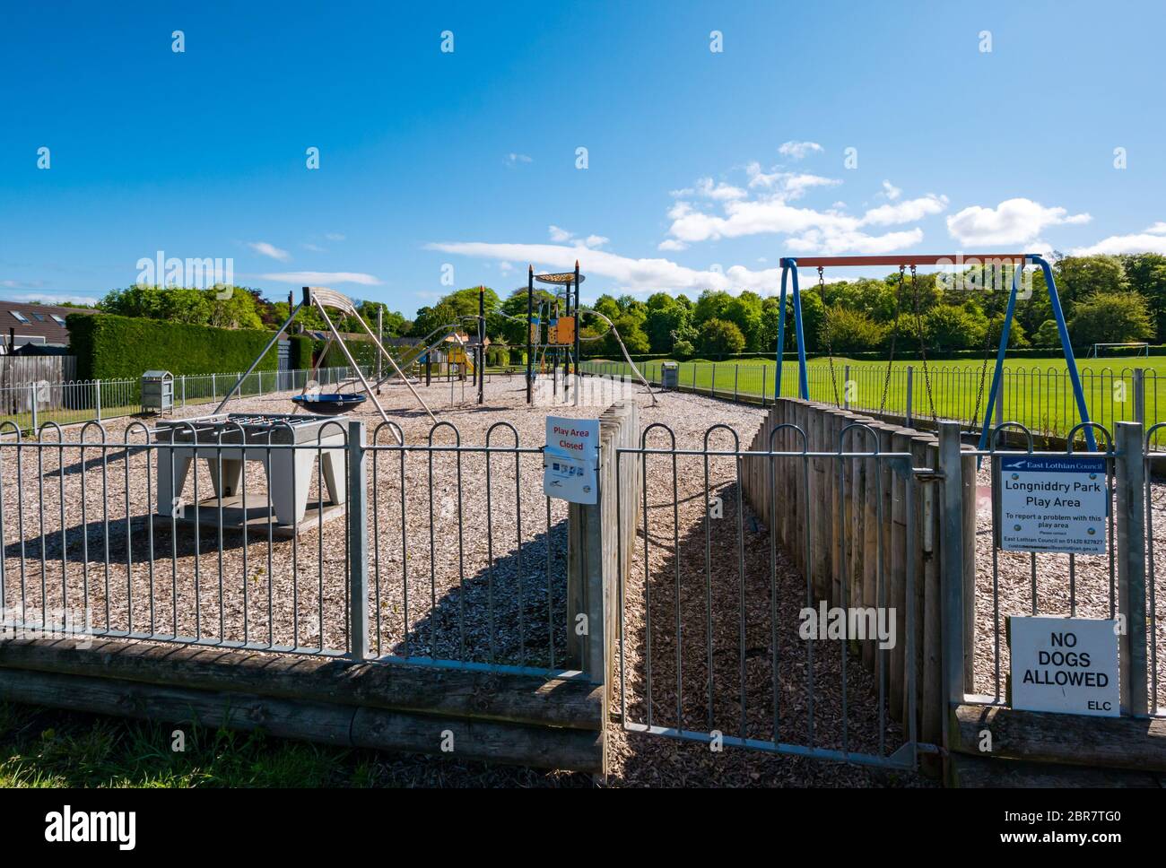 Children's playground closed due to Covid-19 Coronavirus pandemic lockdown on sunny day, Longniddry, East Lothian, Scotland, UK Stock Photo