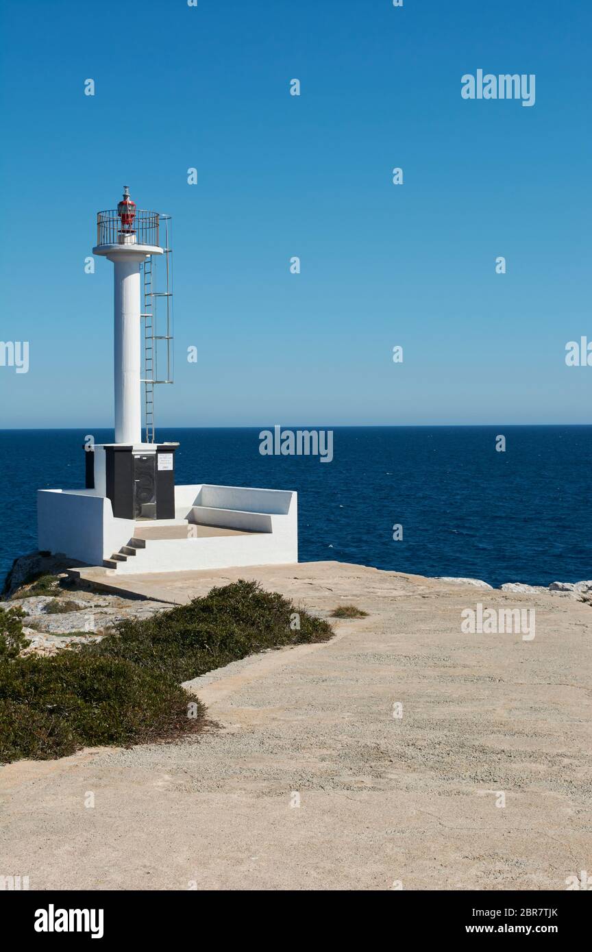 Small Lighthouse on Mallorca torre porto petro, water activities Stock Photo