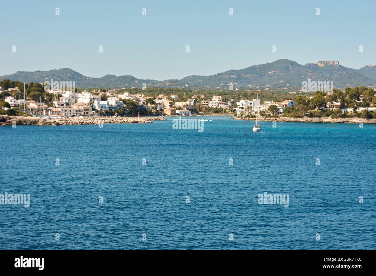 Small Lighthouse on Mallorca torre porto petro, water activities Stock Photo