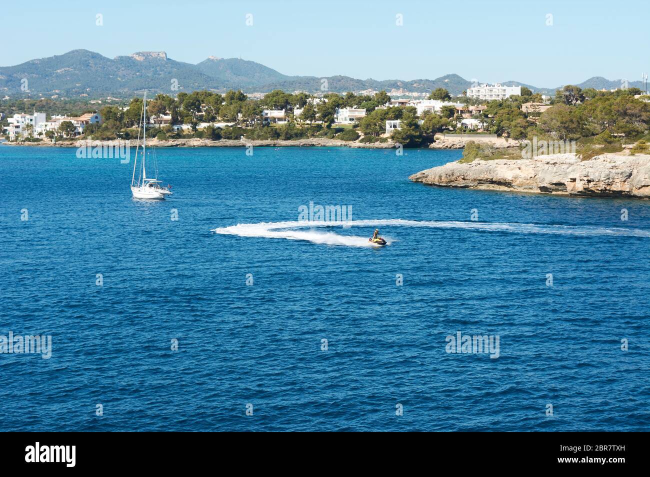 Small Lighthouse on Mallorca torre porto petro, water activities Stock Photo