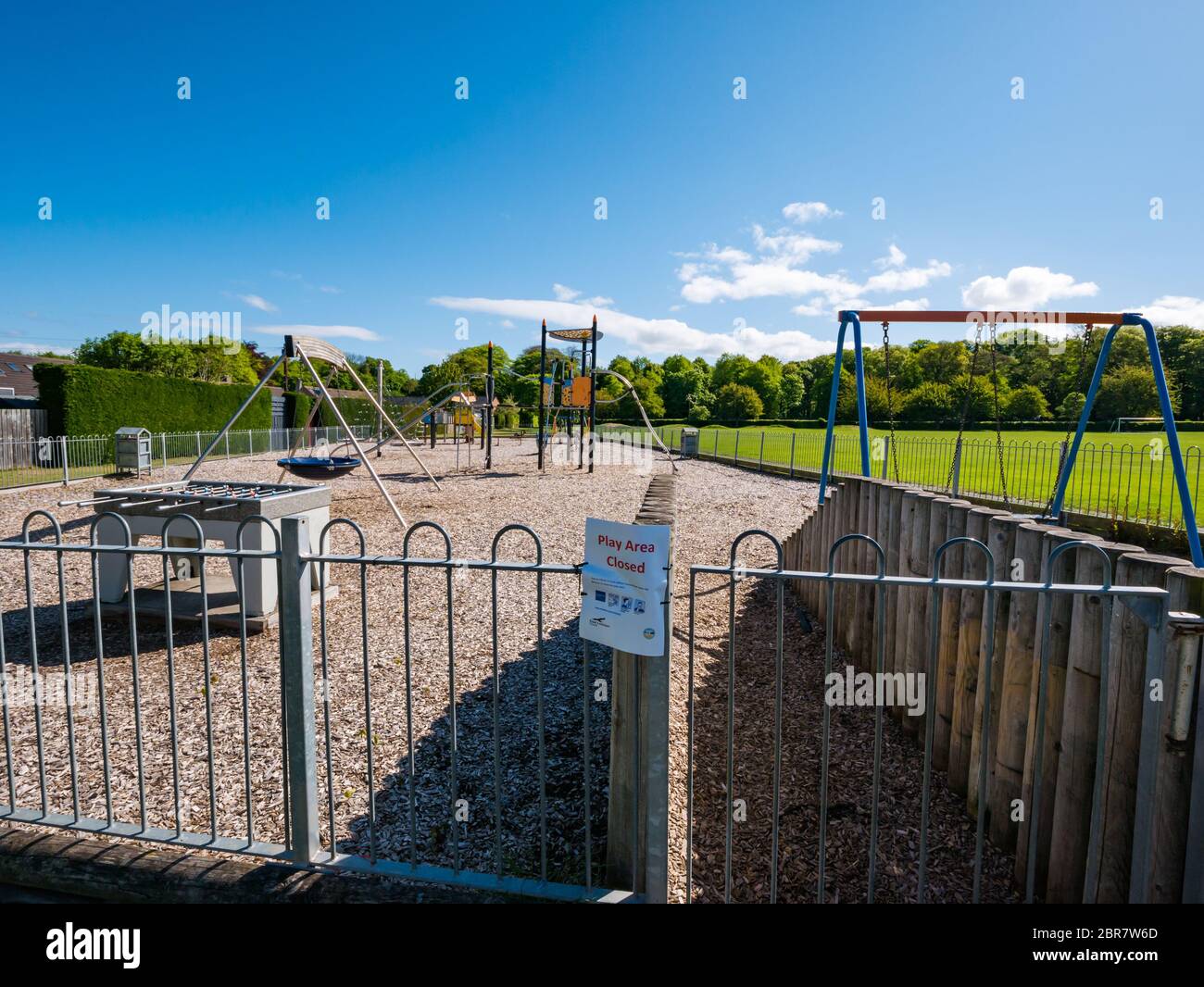 Children's playground closed due to Covid-19 Coronavirus pandemic lockdown on sunny day, Longniddry, East Lothian, Scotland, UK Stock Photo