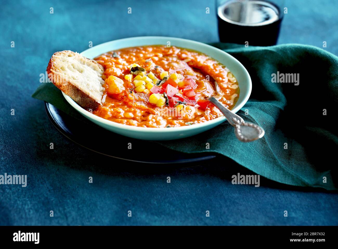 Zesty red lentil tomato soup Stock Photo