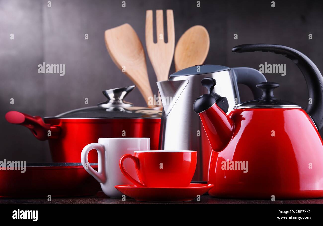 Composition with kitchen vessels, kettles and cups Stock Photo Alamy