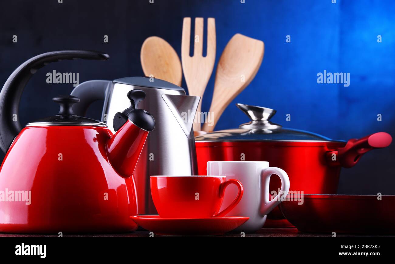 Composition with kitchen vessels, kettles and cups Stock Photo Alamy