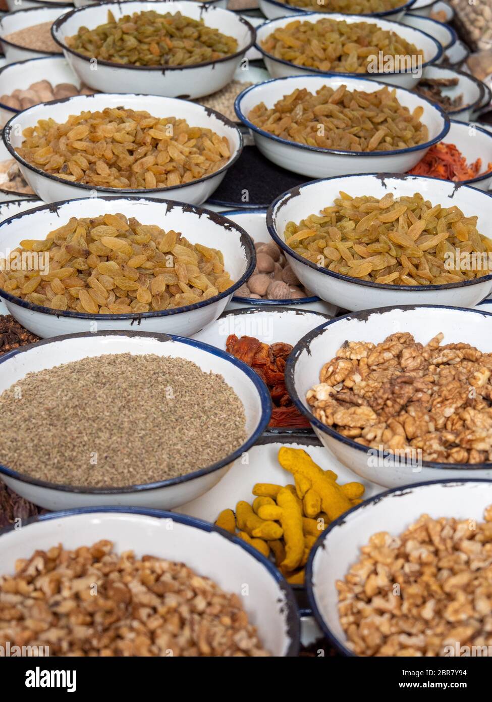 dried fruit and nuts on display in the spice market of chandni chowk in