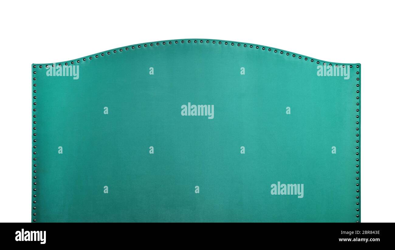 Turquoise green soft velvet fabric shaped bed headboard isolated on white background, front view Stock Photo