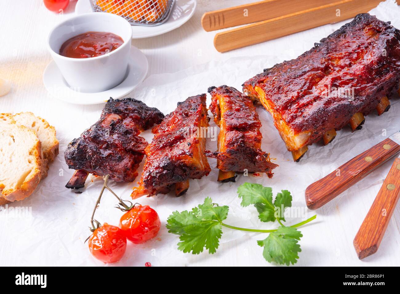 BBQ spare ribs from a charcoal grill Stock Photo Alamy