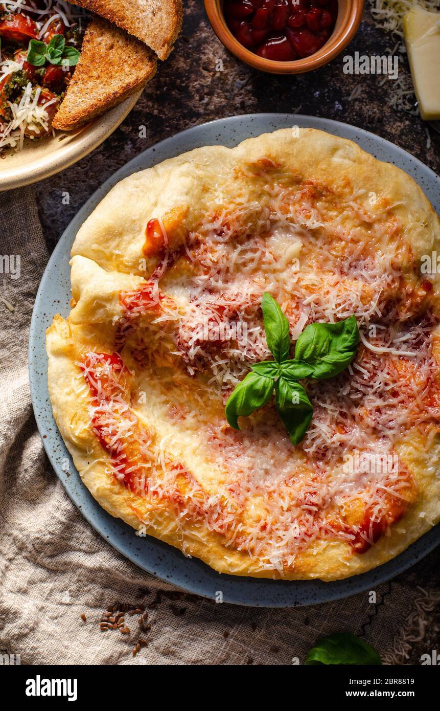 Simple and delicious street food, deep fried, topped with cheese