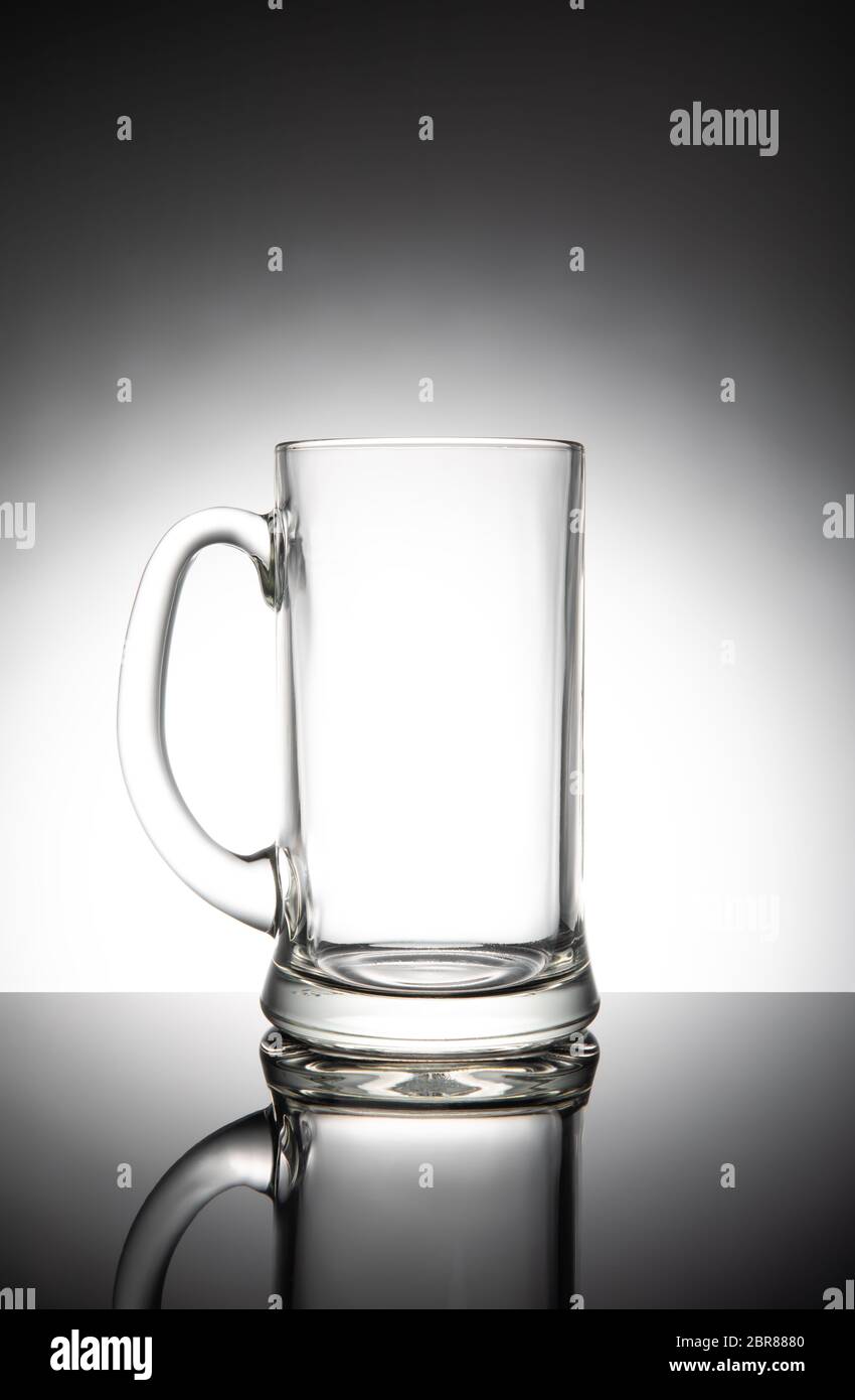 Empty clear beer mug, isolated on white background. Stock Photo