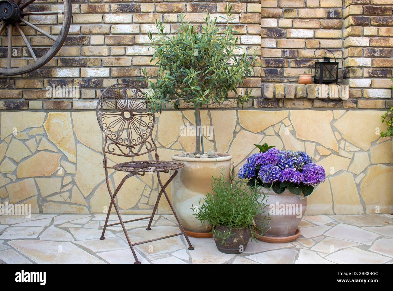 beautiful place in the garden in the mediterranean style, pots with