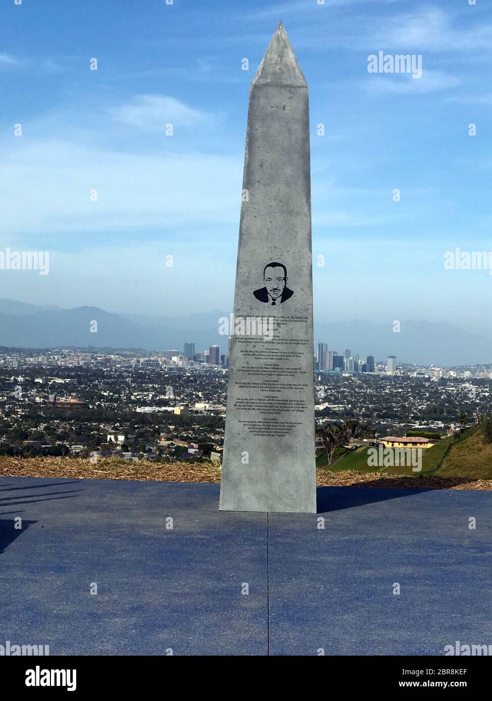 Obelisk honoring Martin Luther King Jr. overlooking view of downtown Los Angeles at the Kenneth Hahn State Recreation Area in Los Angeles, CA Stock Photo