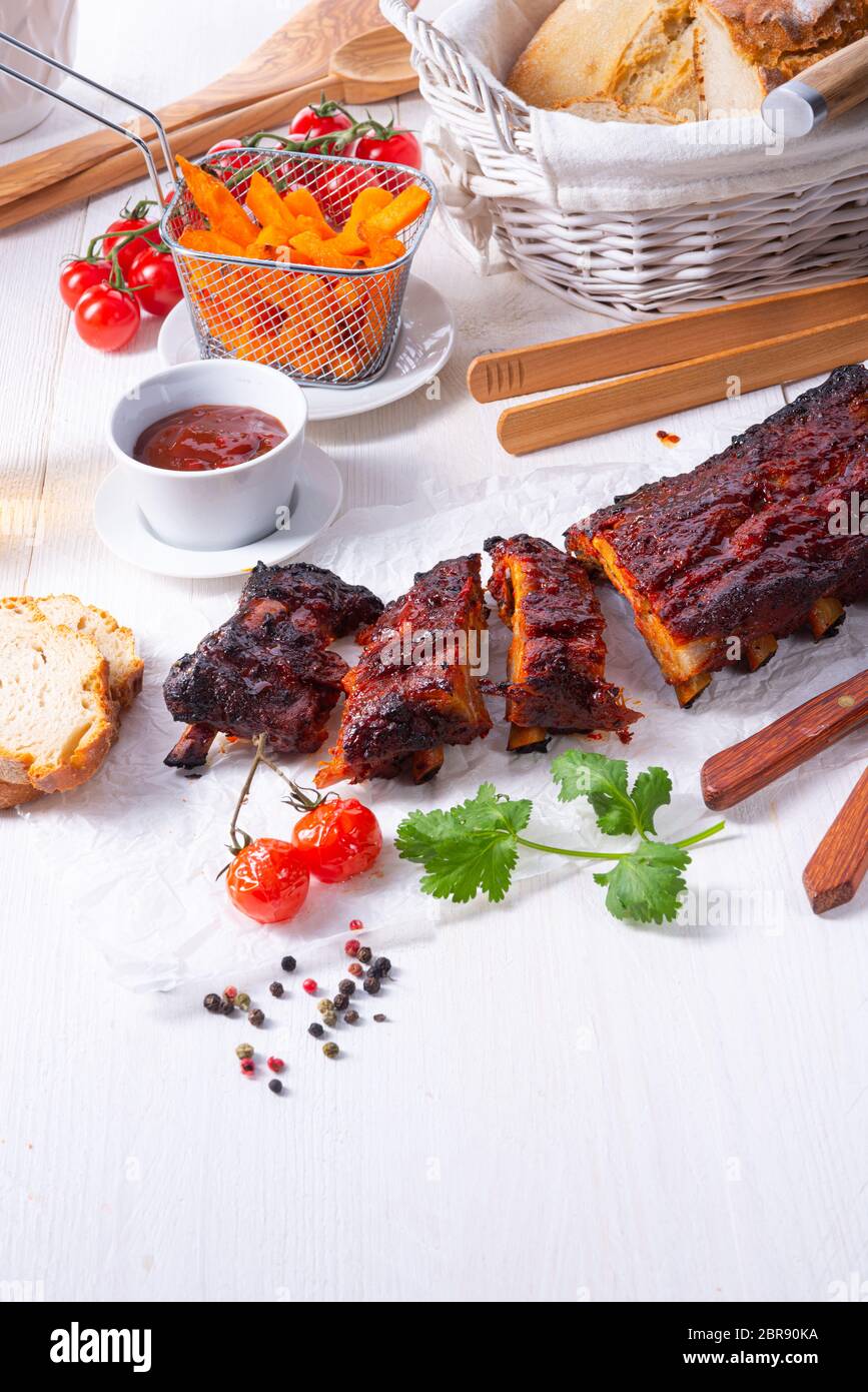 BBQ spare ribs from a charcoal grill Stock Photo Alamy