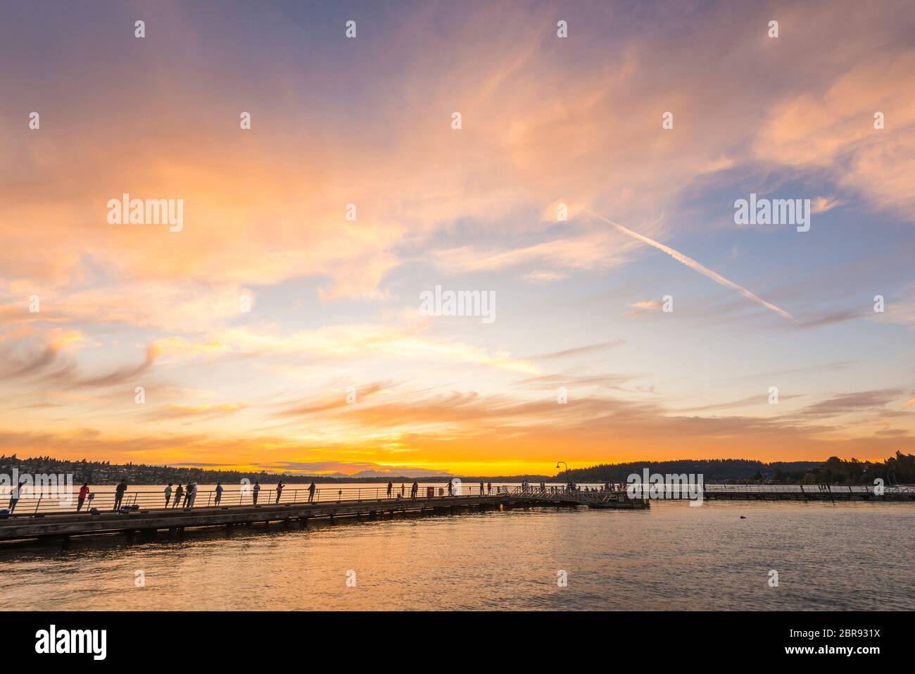 scene of walk way on the lake when sunset. Stock Photo