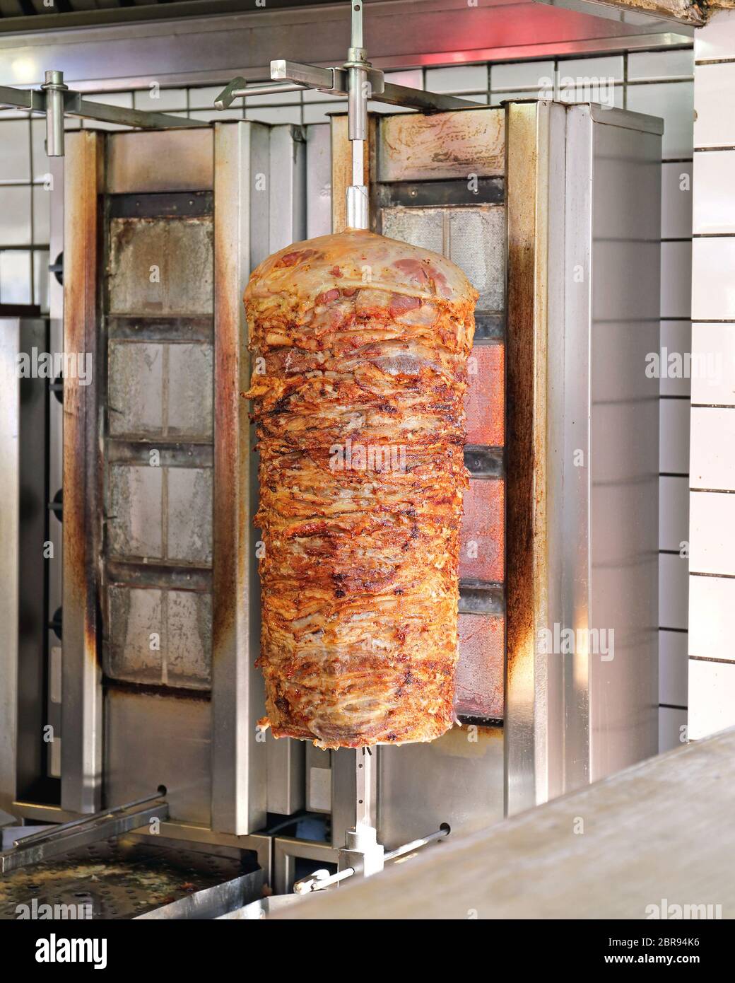 Rotisserie with Greek Pork Meat Gyros Kebab Stock Photo - Alamy