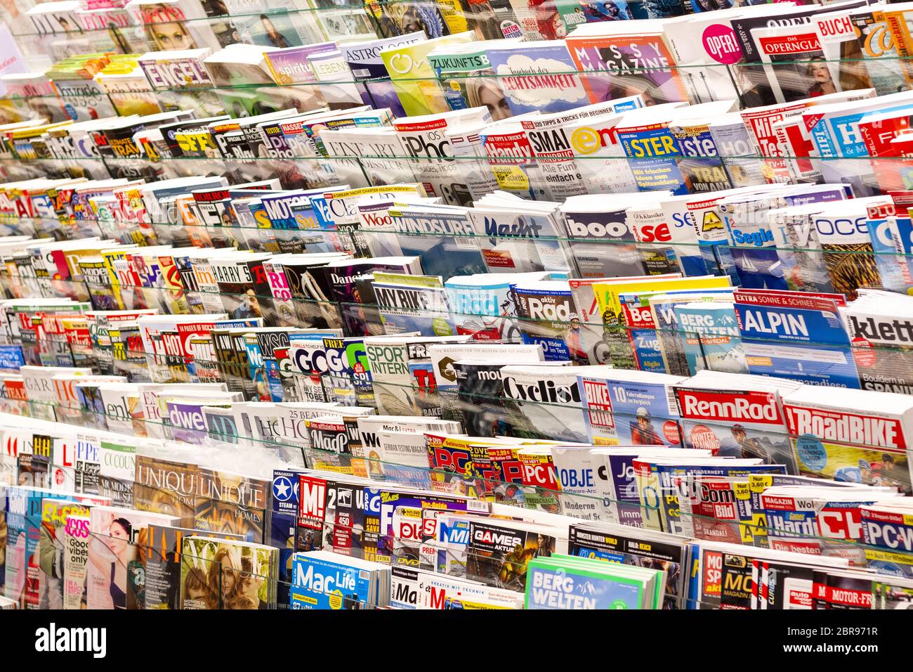 Schwechat, Austria. 2020/02/06. Magazines on display in a store at the Vienna Airport. Stock Photo