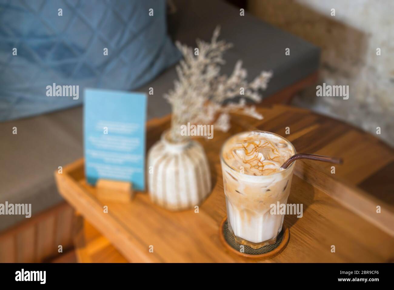 Vanilla iced latte served in a plastic to go cup Stock Photo - Alamy