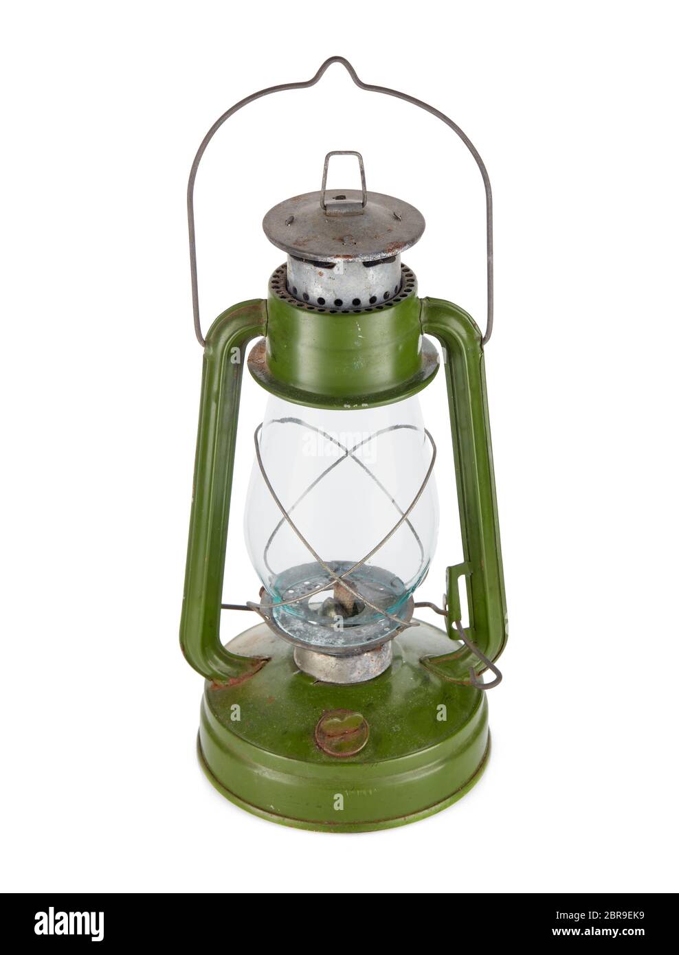 Vintage kerosene lamp isolated on white background. Glass oil lamp. Storm lantern. Top-front view Stock Photo