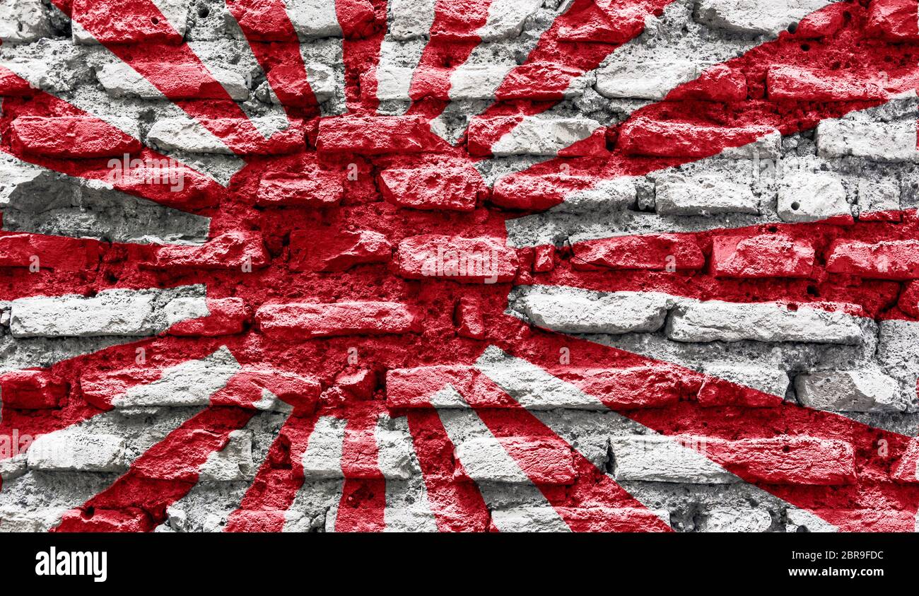 The Japanese Rising Sun Flag Imprinted On An Old Brick Wall Stock Photo Alamy