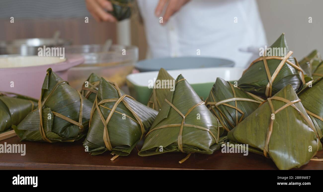 Asian man rice dumplings hi-res stock photography and images - Alamy