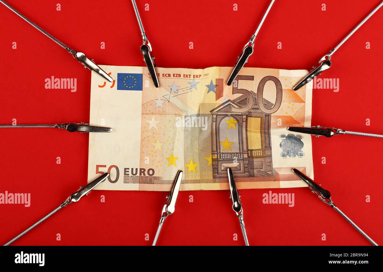 Close up one fifty Euro paper currency banknote pulled and stretched Close up one fifty Euro paper currency banknote pulled and stretched