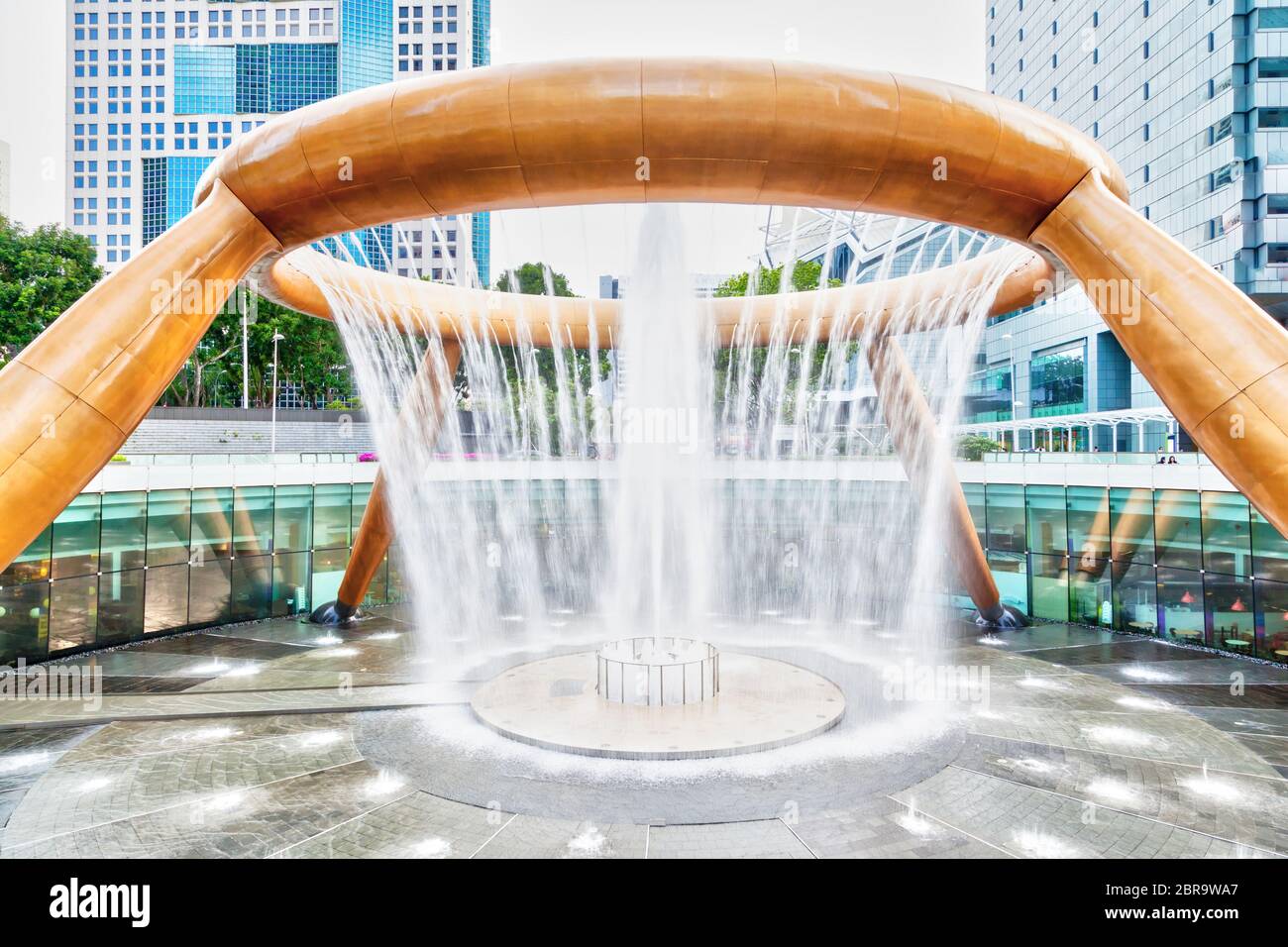 SINGAPORE - MARCH 26, 2015 : The Fountain of Wealth is the largest fountain in the world. It is located in the commercial complex of Suntec City, Sing Stock Photo