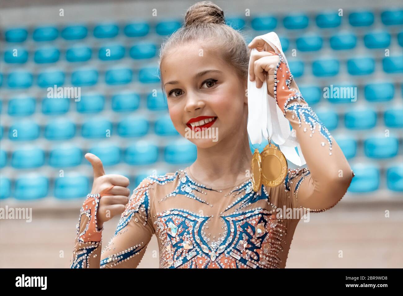 Winner of the rhythmic gymnastics competition, portrait of a pretty