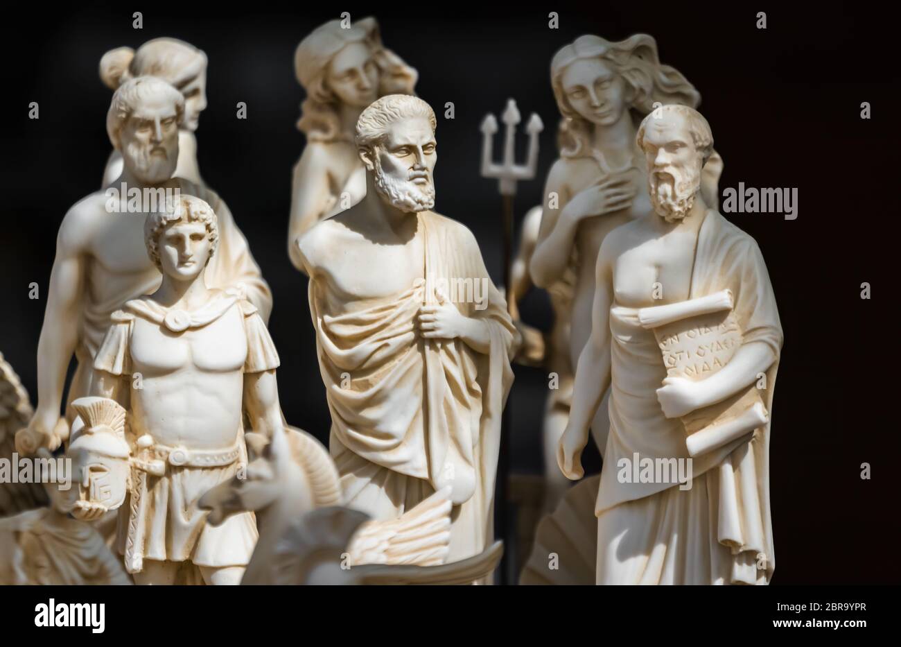 Small statuettes resembling people from ancient Rome and Greece on sale on a souvenir stand, Greece Stock Photo