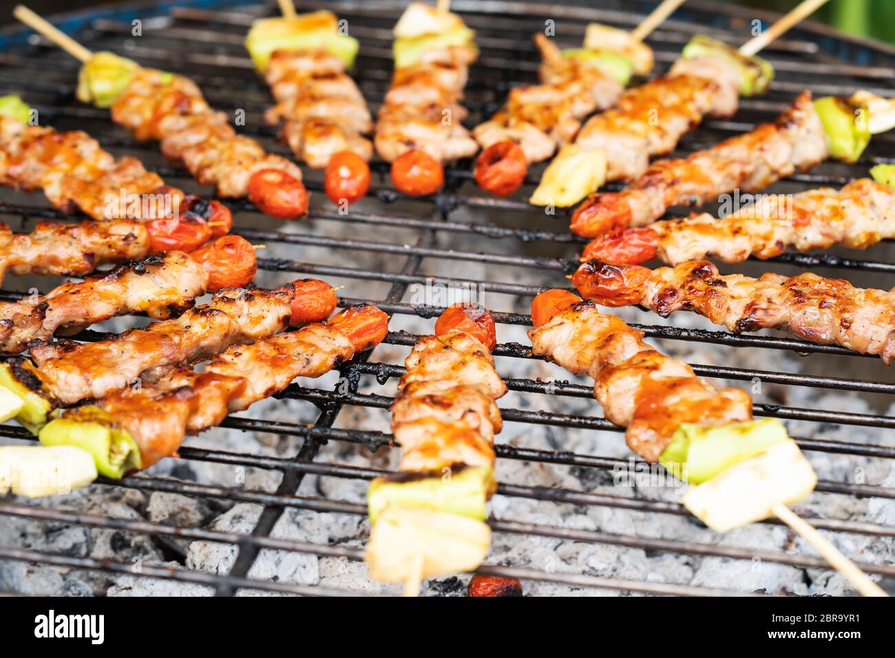 Grilled vegetable and meat skewers on charcoal stove Stock Photo Alamy