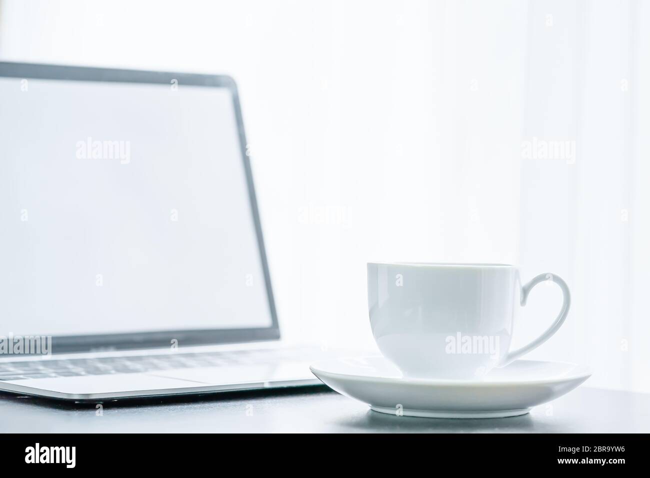 Cup Images Computer Close up laptop computer and coffee cup on table at office Stock Photo ...