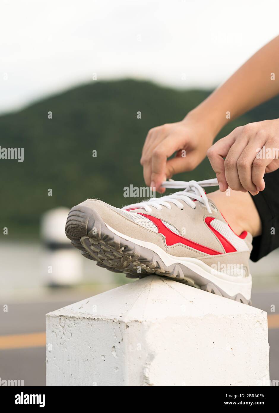 Curated visual reference: Instilling Routine Through Daily Shoelace Tying Reference: Woman Runner Tying Shoelace His Before Starting Running Woman Doing