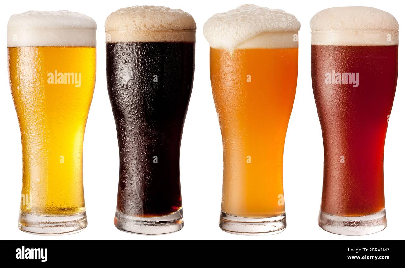 Four glasses with different beers on a white background. The file contains a path to cut. Stock Photo