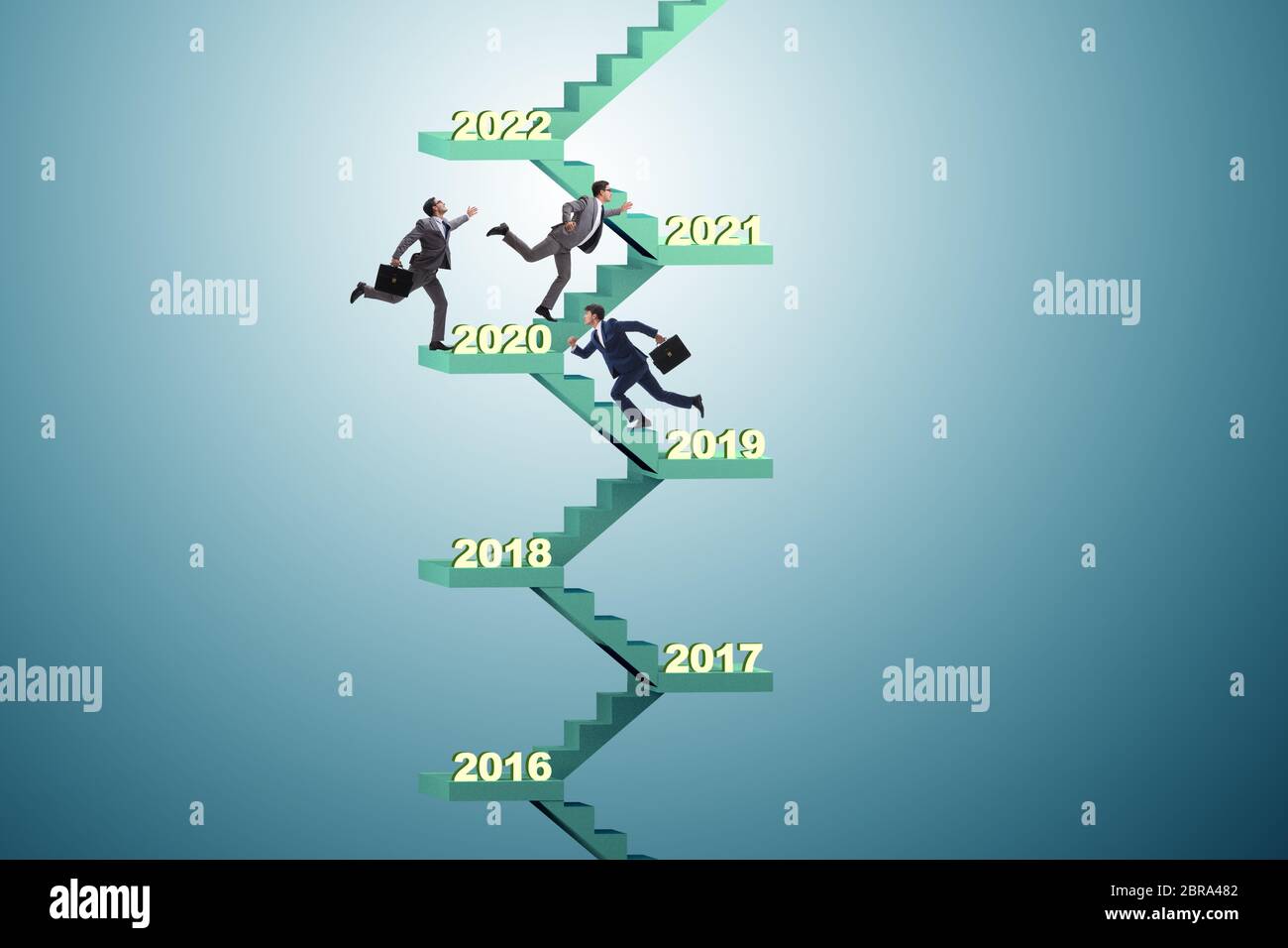 Businessman climbing the stairs on yearly basis Stock Photo - Alamy