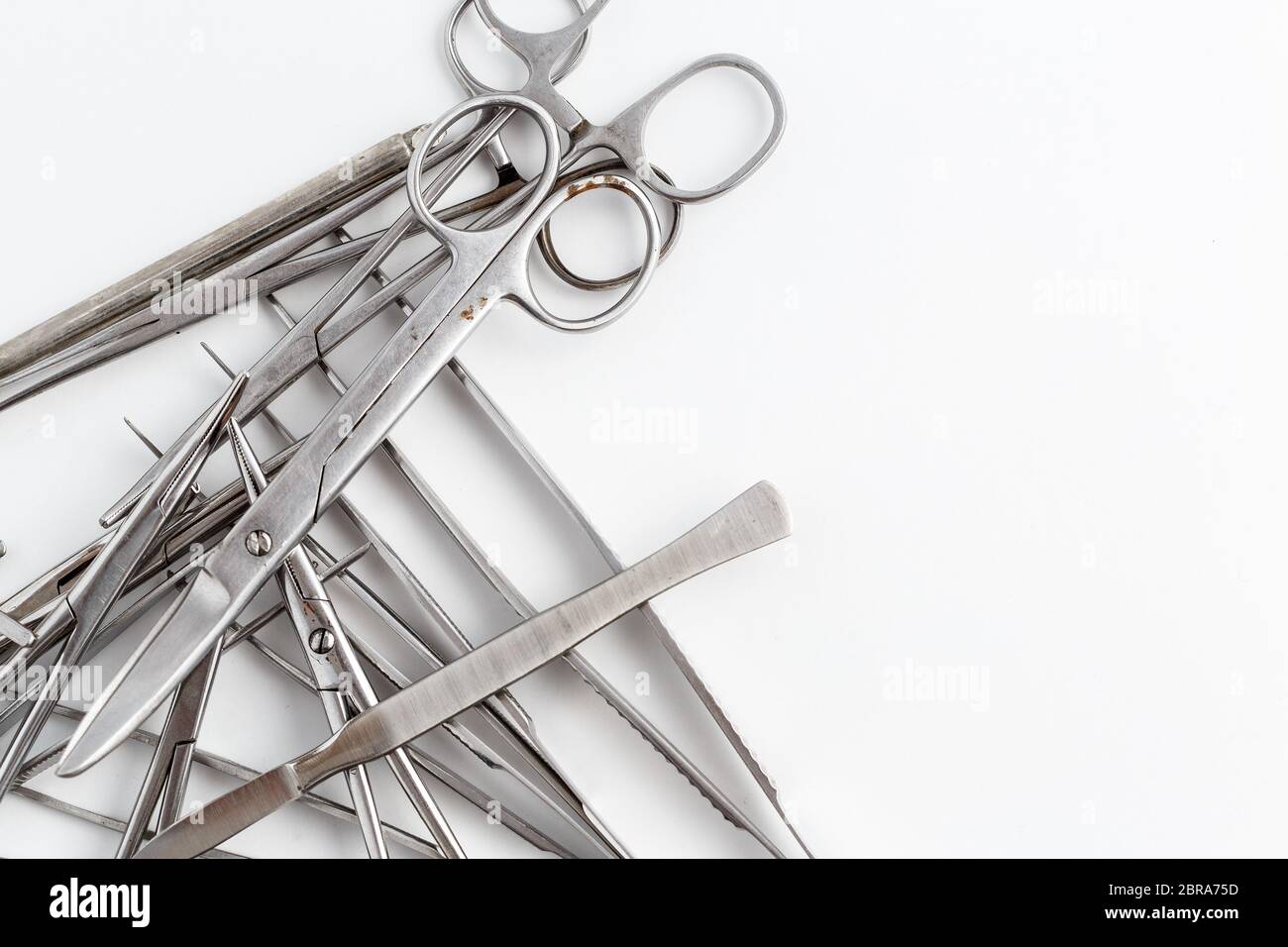 surgical instruments on white isolated background. top view Stock Photo ...