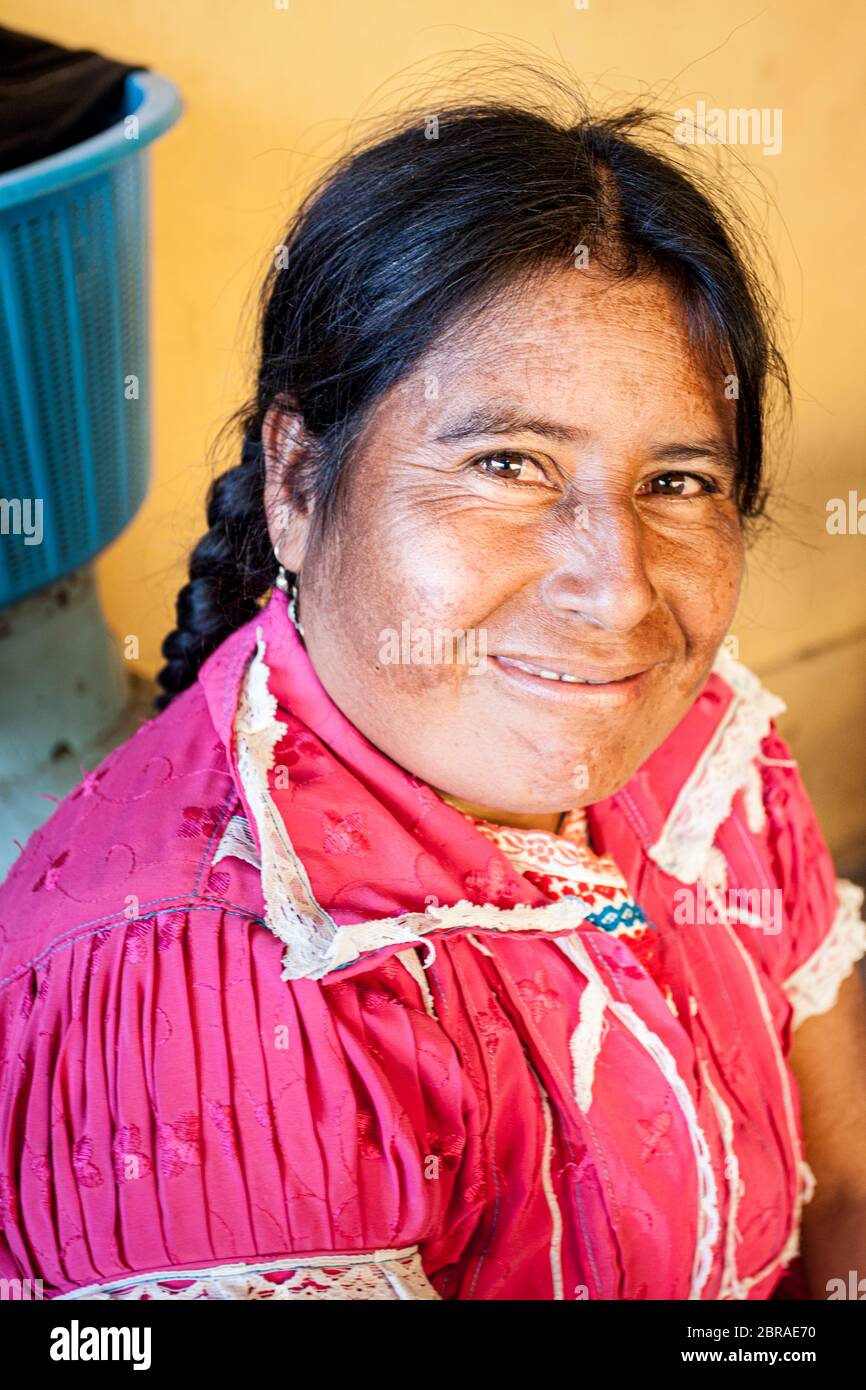 An artisan who hand sews traditional blouses in San Vicente Coatlan, Oaxaca, Mexico. Stock Photo