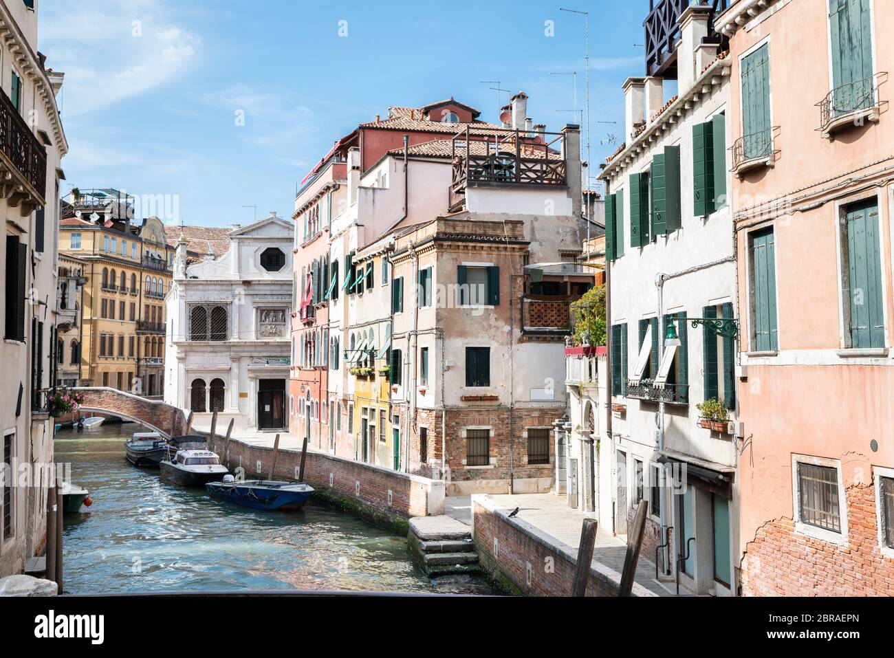 Canal Between Old Historic Houses In Venice Stock Photo - Alamy