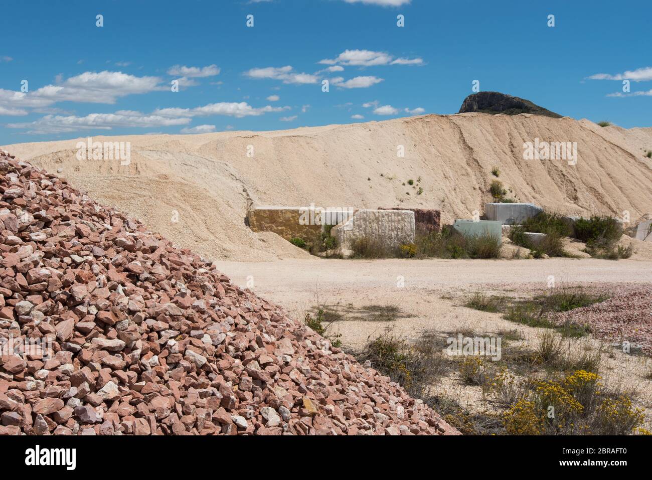 heaps of gravel and sand in surface quarry Stock Photo
