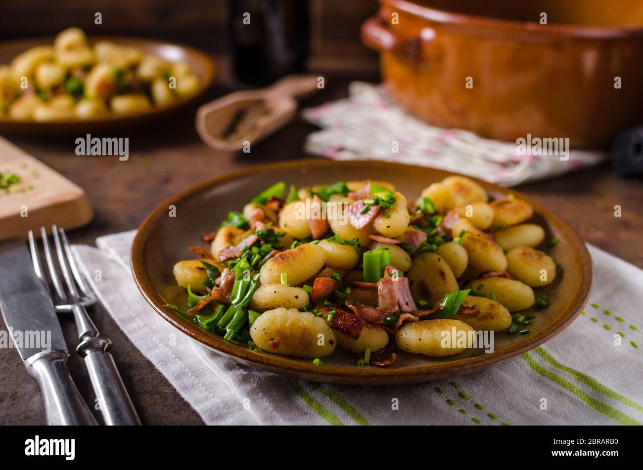 fried homemade gnocchi, lots of herbs and bacon in mixture, delicious