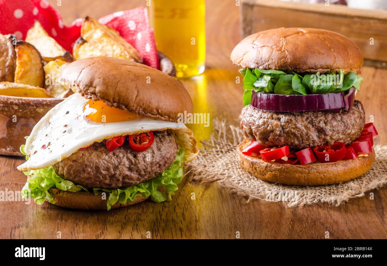 Delicious beef burger with egg and chilli Stock Photo Alamy