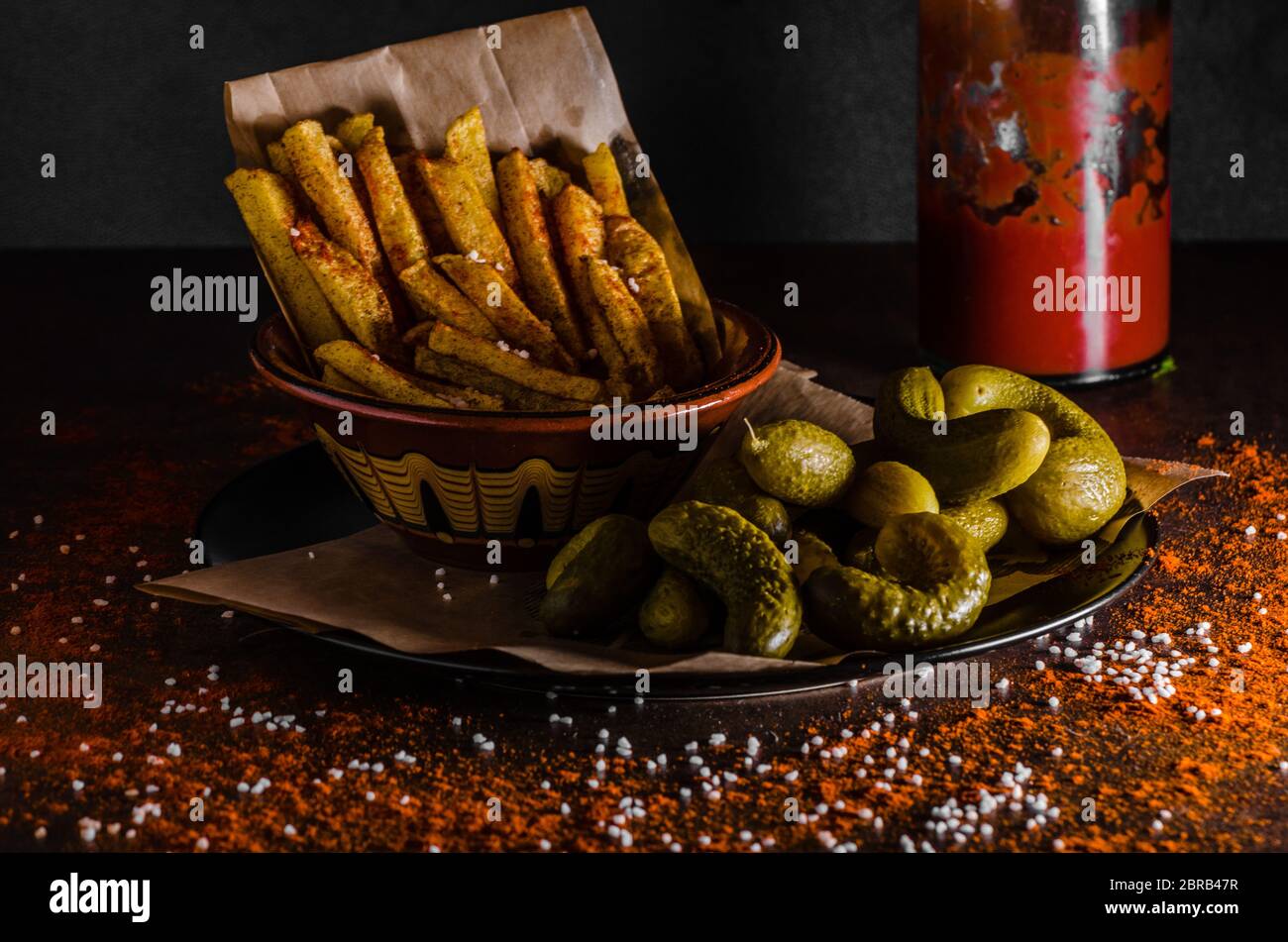 French fries and homemade ketchup, pickles, all homemade Stock Photo Alamy