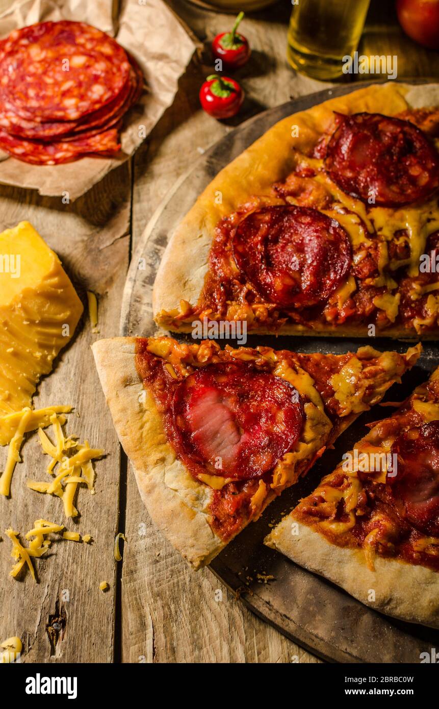 Rustic salami pizza with cheddar cheese and chorizo, delicious chorizo ...
