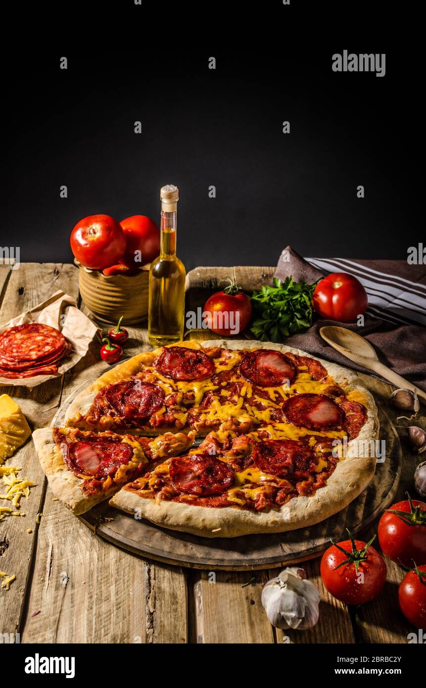 Rustic salami pizza with cheddar cheese and chorizo, delicious chorizo ...
