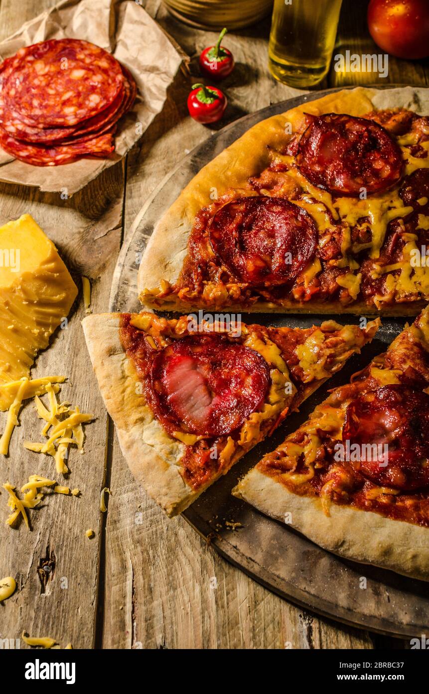 Rustic salami pizza with cheddar cheese and chorizo, delicious chorizo ...