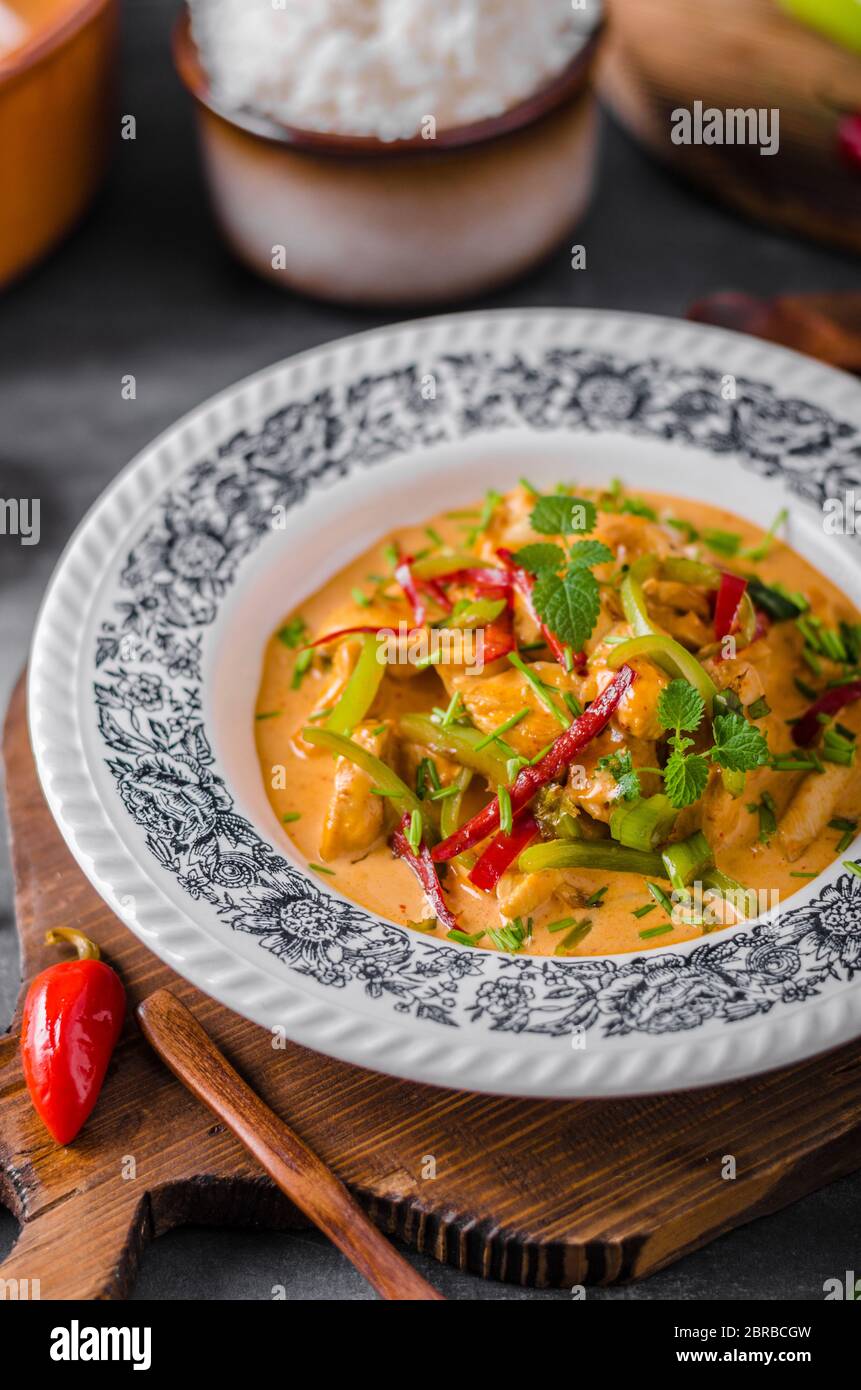 Chicken curry delish food, with rice and herbs Stock Photo Alamy