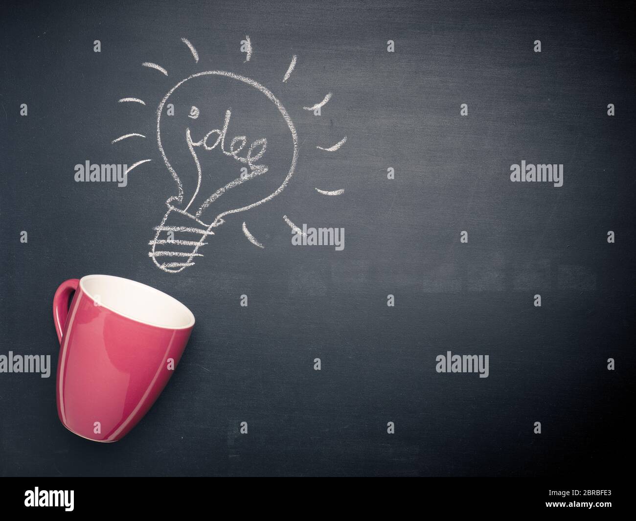 Coffee cup with a light bulb on a chalkboard, great idea concept Stock Photo