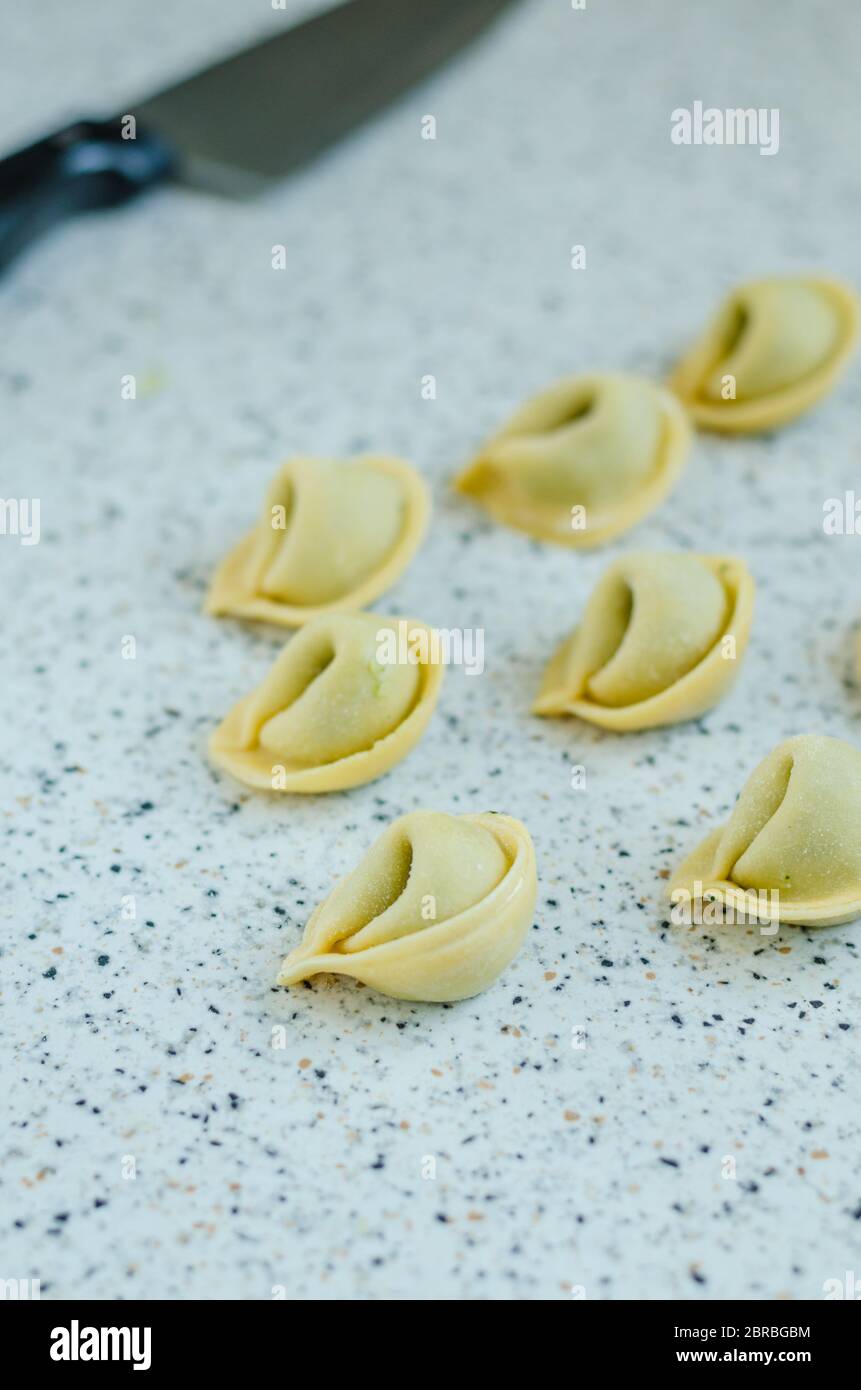 Making tortellini with cheese and bear garlic Stock Photo Alamy