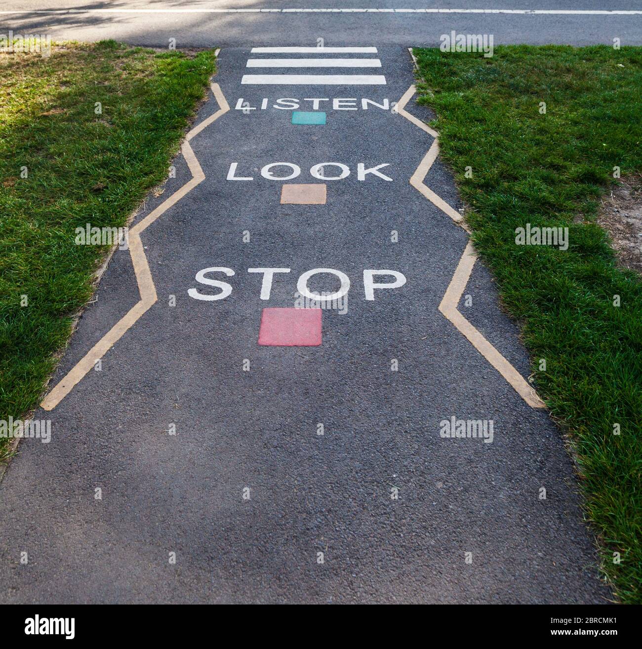 A zebra crossing painted on a path at a play park, Stockton on Tees, England, U K Stock Photo
